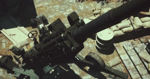 Military Artillery Positioned on the Battlefield During a Tense Moment