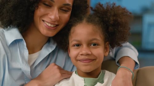 African American Woman Little Girl Looking at Camera Mother Daughter Happy Family Together Faces Mom