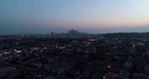 Aerial view of Los Angeles skyline at sunset, California, United States.