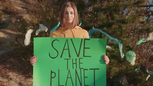 Portrait Young Woman Activist Holding Encouraging Green Poster Save the Planet Standing at Landfill