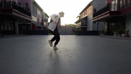 Young Man Breakdancing In Bangkok Town Square
