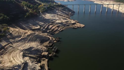 Drone Footage Of Ancient Village Ruins In A Reservoir Sunny And Clear Day