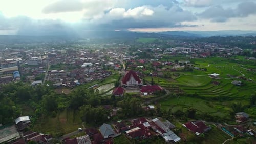 Aerial High Angle View of a Rural Highland City and Lush Rice Terraces