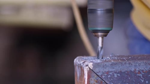 Drilling Metal In An Industrial Working Environment 1