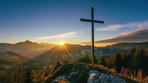 Sunset Over Steel Cross in Rocky Hill in Rural Nature
