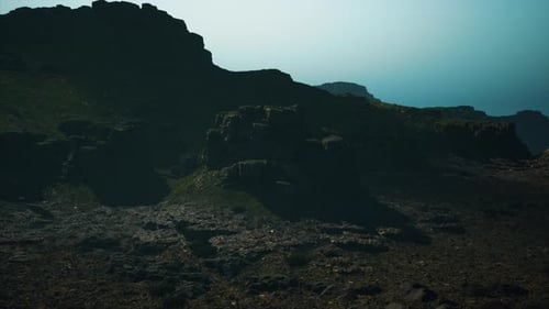 A Very Large Mountain with Some Rocks on Top of It