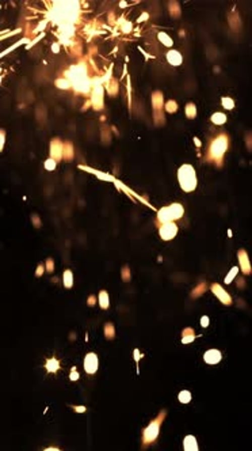 Bright Lights of New Year's Fireworks on a Black backgroundFilmed is Slow Motion 1000 Frames Per