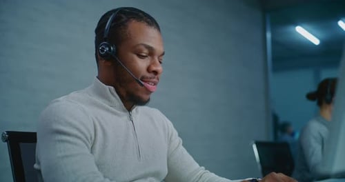 Young Adult Working in Bright Modern Office