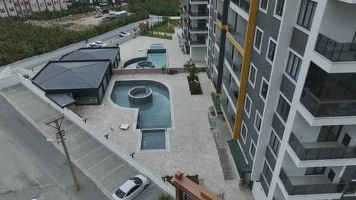 Apartment Building With Modern Recreation Area Aerial Shot
