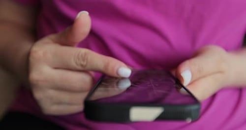 Adult Scrolling on a Mobile Phone, Close-Up