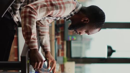 Man Using Tablet in Modern Office Environment