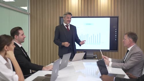 Business Presentation in Modern Conference Room with Colleagues