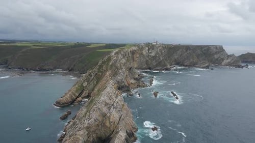 Aerial view of Asturias coastline. Drone shot of sea, cliff, rocks and the Atlantic ocean in Spain.