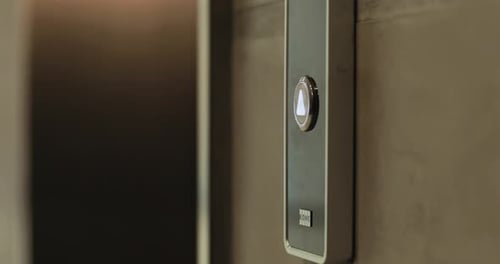 Close Up Hand Young Man Presses a Button of Lift to Go Up By a Finger Elevator Business Technology
