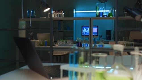 Science Laboratory with Microscope and Test Tubes