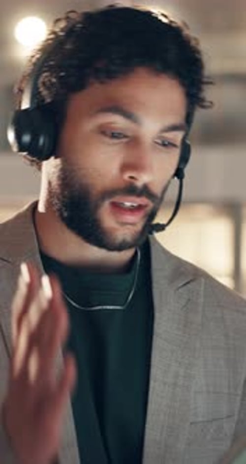 Man, headset and tablet at night in call centre for consulting, customer support and online inquiry