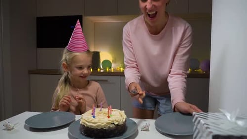 Mother and Child Celebrating Birthday at Home