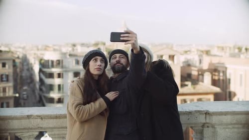 Friends Taking a Selfie on Vacation in Rome