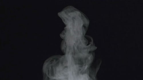 White Smoke Rising on Black Background