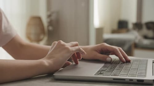 Hands Swipe on Laptop Touchpad Close Up Woman Arms on Computer