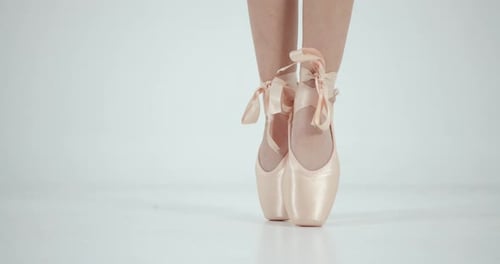 Ballet Dancer Performing Pointe Work in Studio