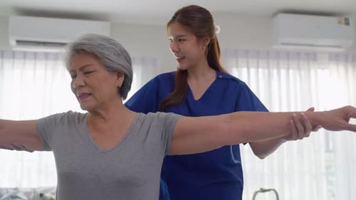 Physical Therapy with a Senior Woman at Home