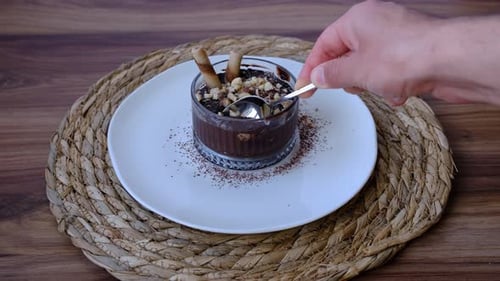 Chocolate Pudding with Nuts Served in a Glass