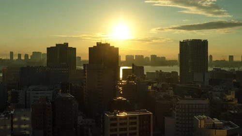 Time Lapse densely packed buildings of Tokyo at sunrise