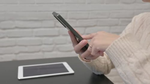 Close up of Browsing Internet on Smartphone