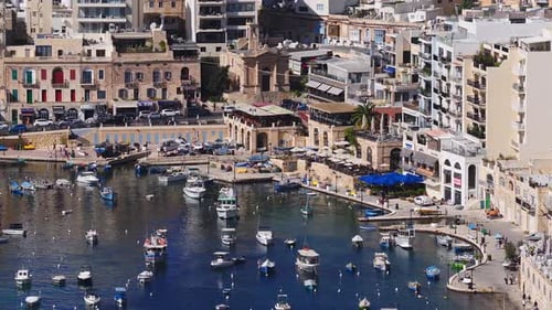 Aerial View of Sliema Seafront Marina with Boats and Cafes Malta
