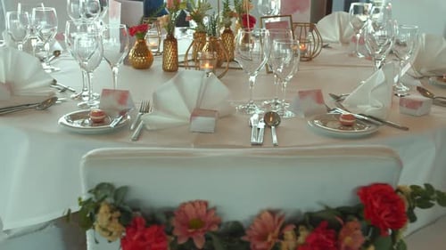 Beautiful Wedding Reception Table Setting with Floral Decor