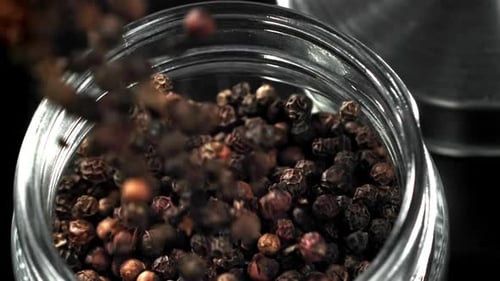 A Jar of Black Pepper Filmed on a Highspeed Camera at 1000 Fps