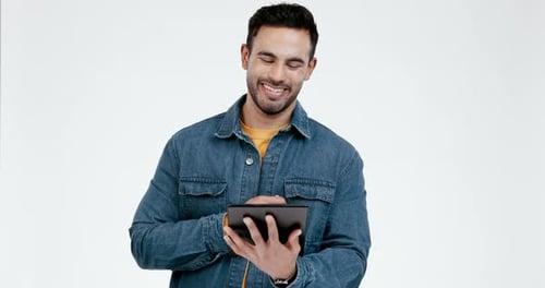 Man, happy and tablet for social media in studio on white background, ebook