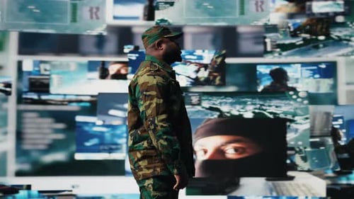 Black Army Officer Working in a Virtual War Zone with Digital Satellite Data
