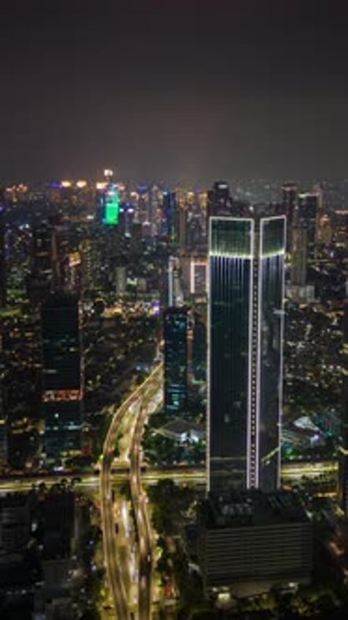 Aerial Timelapse Of Traffic In Business District And Jakarta Cityscape Indonesia