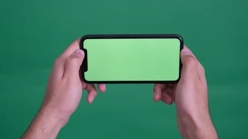 Holding Green Screen Phone
