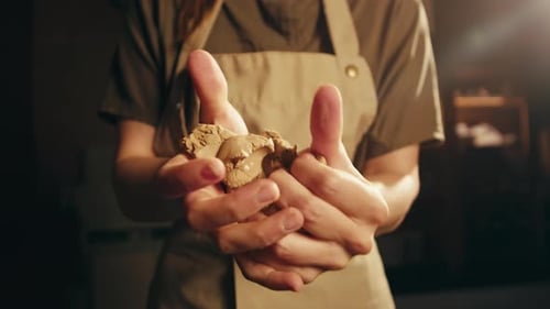 Woman Potter Works with Clay on Master Class in Studio Working Process in Ceramic Workshop Potter