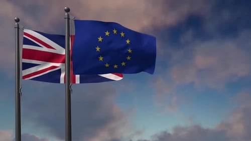 United Kingdom and European Union Flags Waving Against Sky