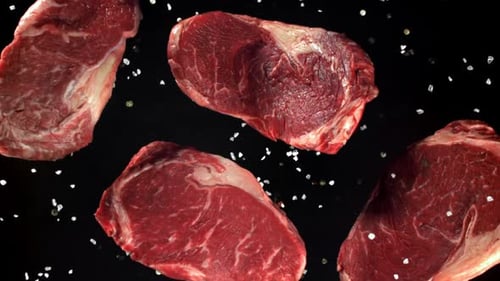 Beef Ribeye Steak Fly Up and Falls Down Filmed on a Highspeed Camera at 1000 Fps