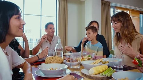 Diverse Group Enjoying Lunch Together at Home