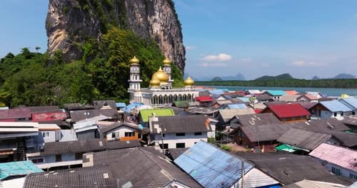 Floating Village Settlements And Darussalam Mosque In Ko Panyi, Thailand. Aerial Drone Shot