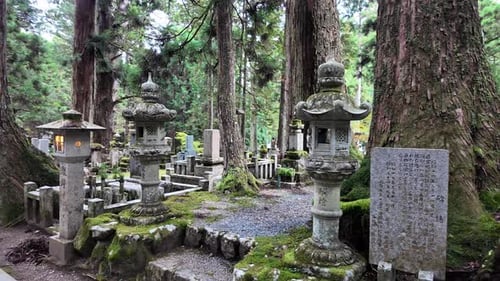 Traditional Japanese Temple Bell in Cemetery at Mount Koya During Autumn