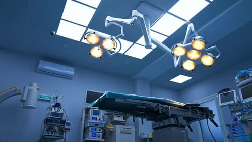 Lights on in the modern operational room. Big white surgical theatre ward with advanced equipment