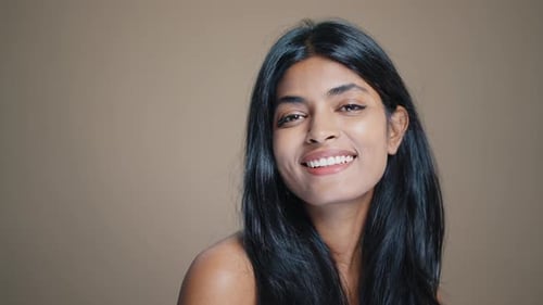 Smiling Woman with Long Dark Hair Portrait