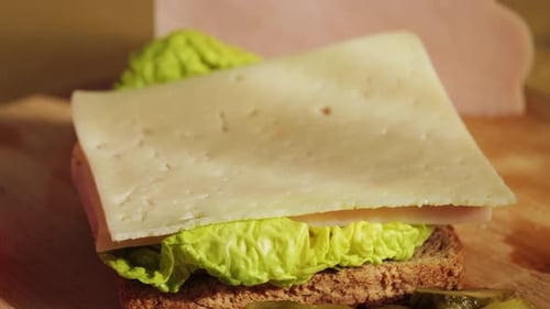 Making a Delicious Open Face Sandwich with Toppings