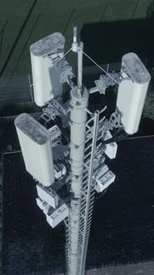 Stunning Aerial View of a Communication Tower Featuring Multiple Antennas Available