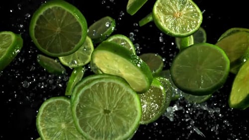Close Up Slices of Lime Floating in Air