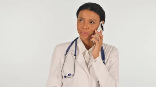 Woman Doctor Talking on Cell Phone