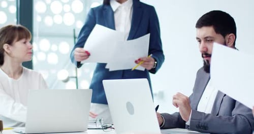 Team Working Together in Modern Office