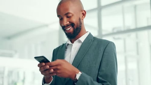 Business, black man and happy with phone in office for text message, good news